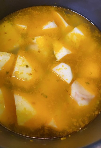 Potatoes, yellow onion and annatto oil