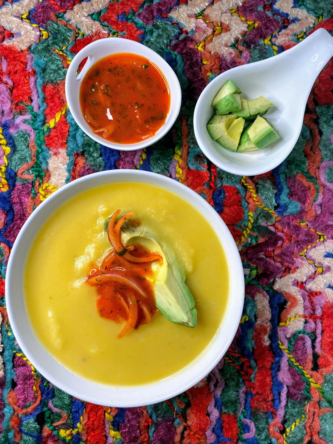 Locro with avocado and aji