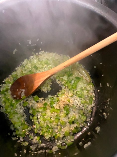 Saute onion, pepper, and bay leaves